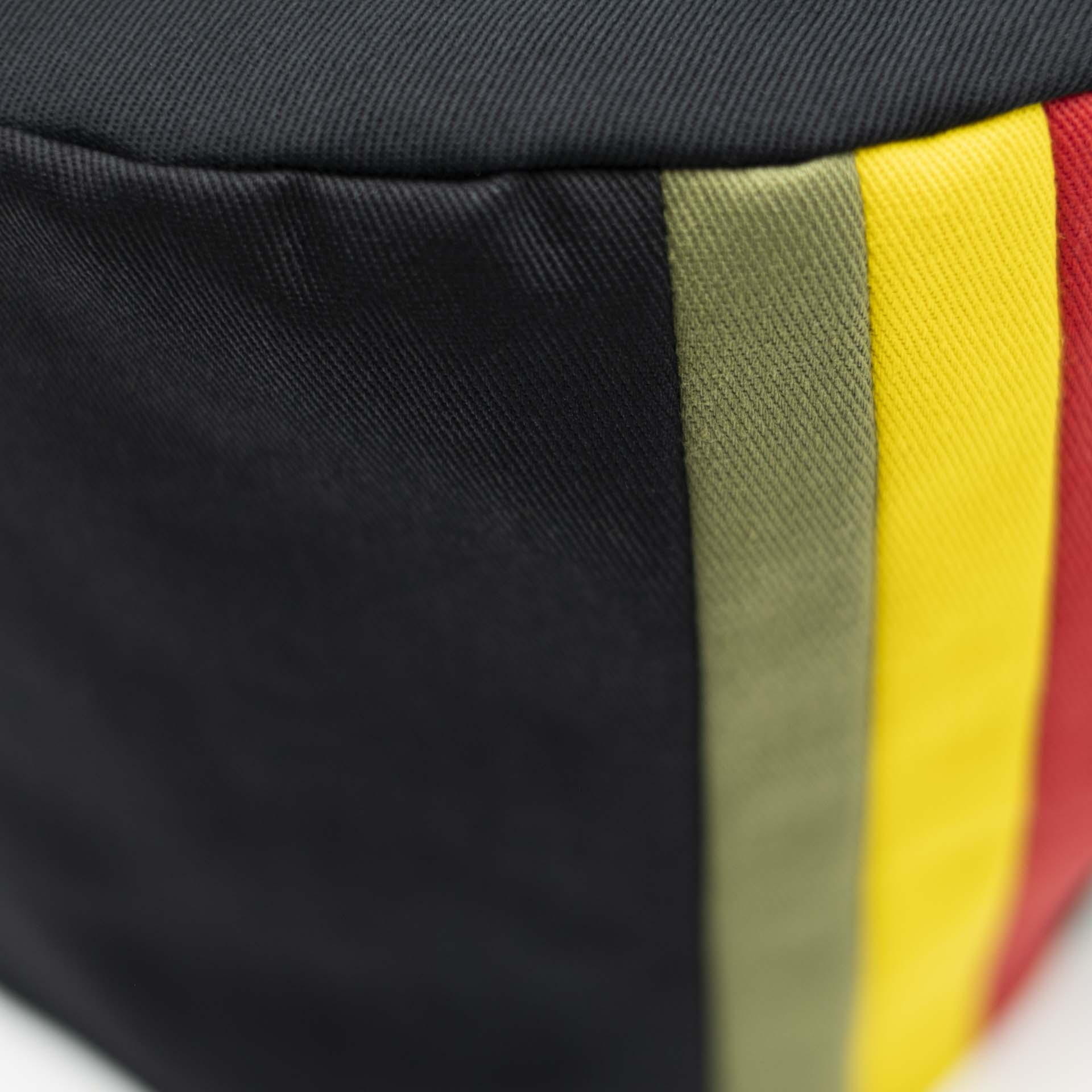 Rasta hat without visor in black cotton with 3 stripes green yellow red on the Ethiopian side. Integrated liner