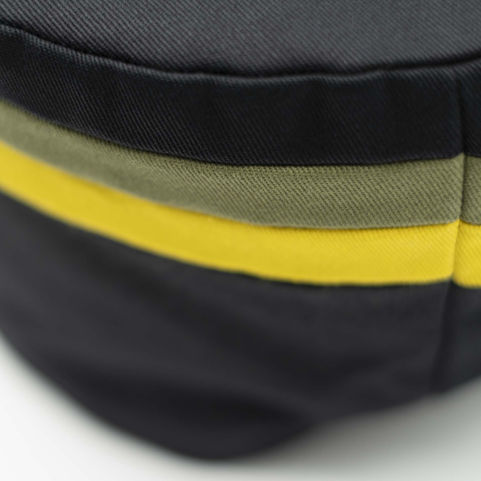 Rasta hat without visor in black cotton with two thin yellow and green stripes on the top of the tam Jamaica colors