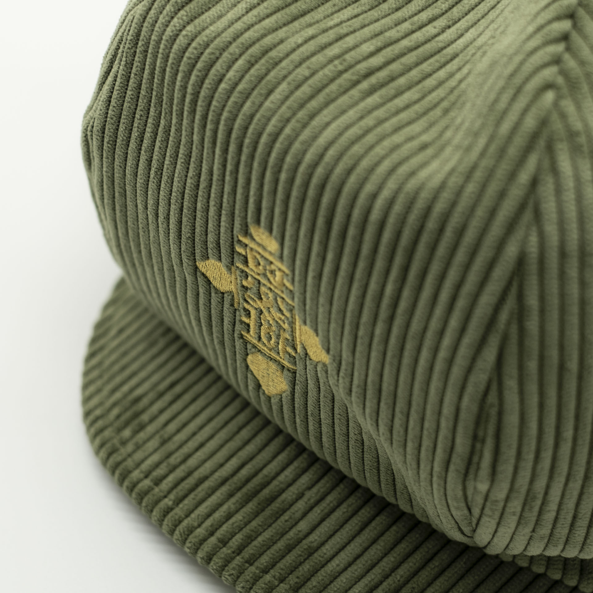 Khaki corduroy rasta hat for dreads with gold Ethiopian cross embroidery