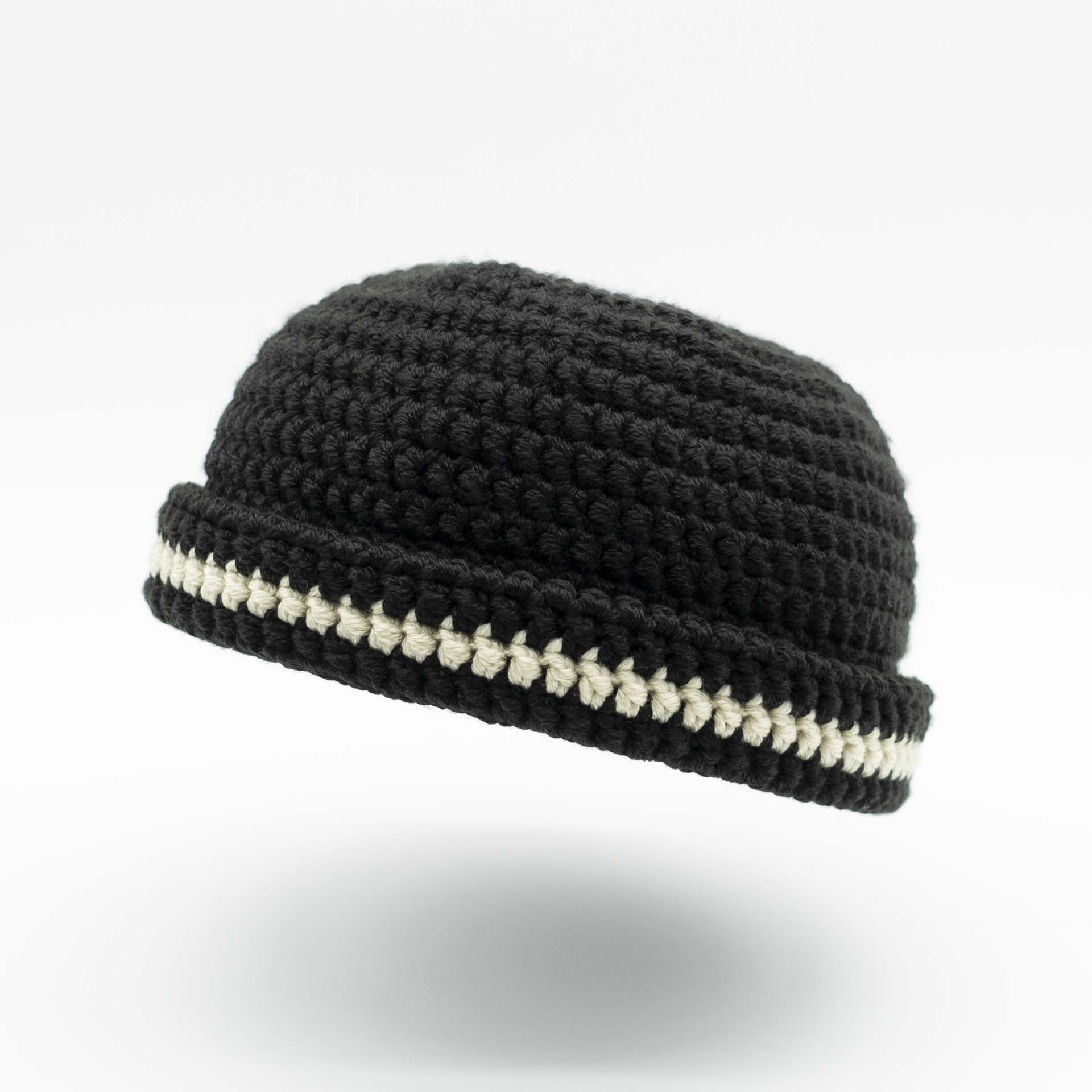 Beanie wool Rasta hat in black with a thin cream band on the hem