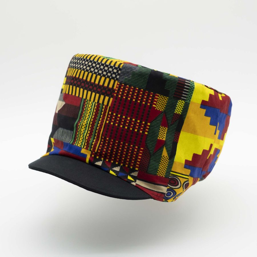 Rasta dreadlocks hat with black visor in light wax fabric with colorful African patterns black lining