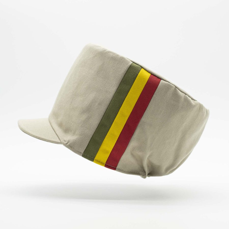 Rasta crown with visor for dreadlocks in beige cotton with three green yellow red stripes on one side of the hat and ecru lining