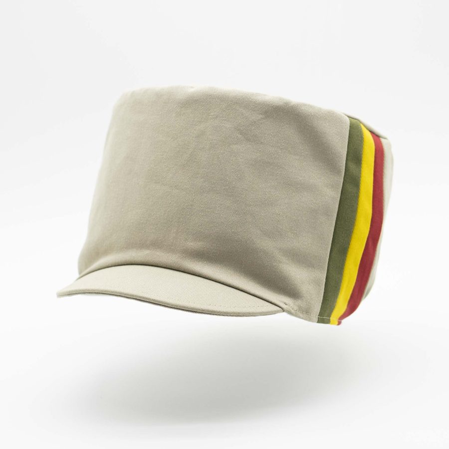 Rasta hat for dreadlocks in beige cotton with three green yellow red stripes on one side of the hat and ecru lining