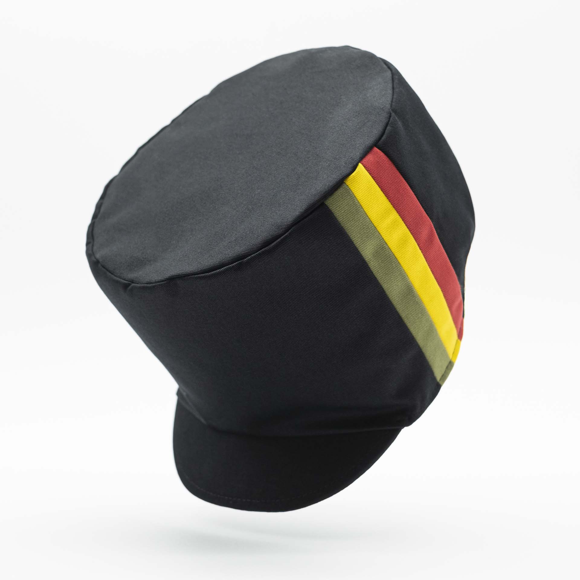 Rasta hat for dreadlocks in black cotton with three stripes green yellow red on one side of the hat and black lining