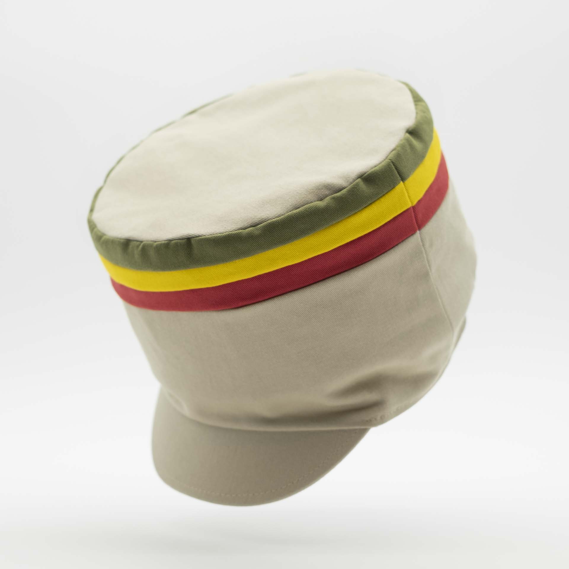 Rasta hat with visor for dreadlocks in beige cotton with three red yellow green stripes on the top of the hat and ecru lining