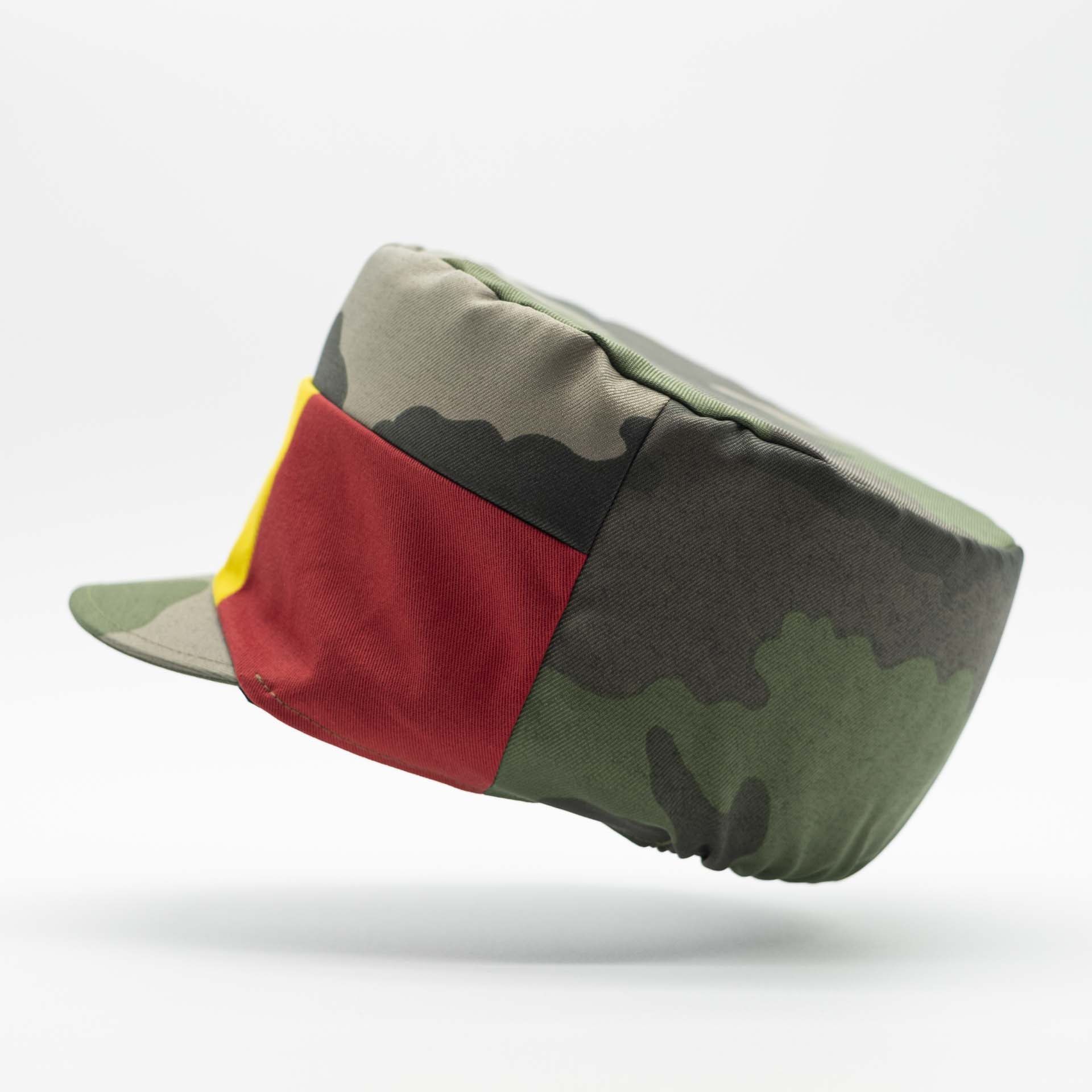 Rasta cap with visor for dreadlocks military camouflage fabric with a red yellow green panel on the front of the hat black lining