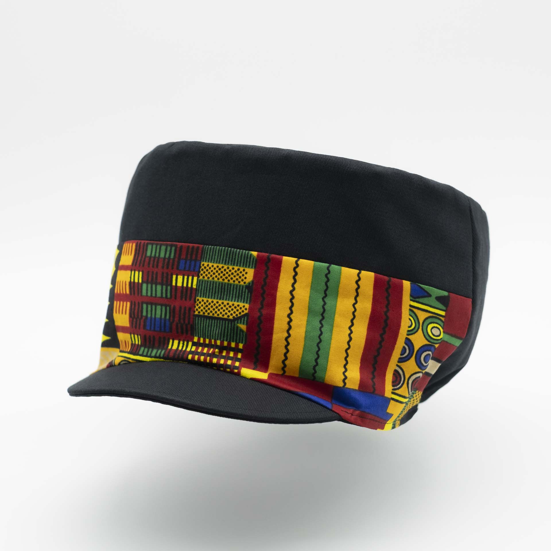 Rasta cap with dreadlocks in black cotton with a front pant in colored wax patterns from Ghana, black lining