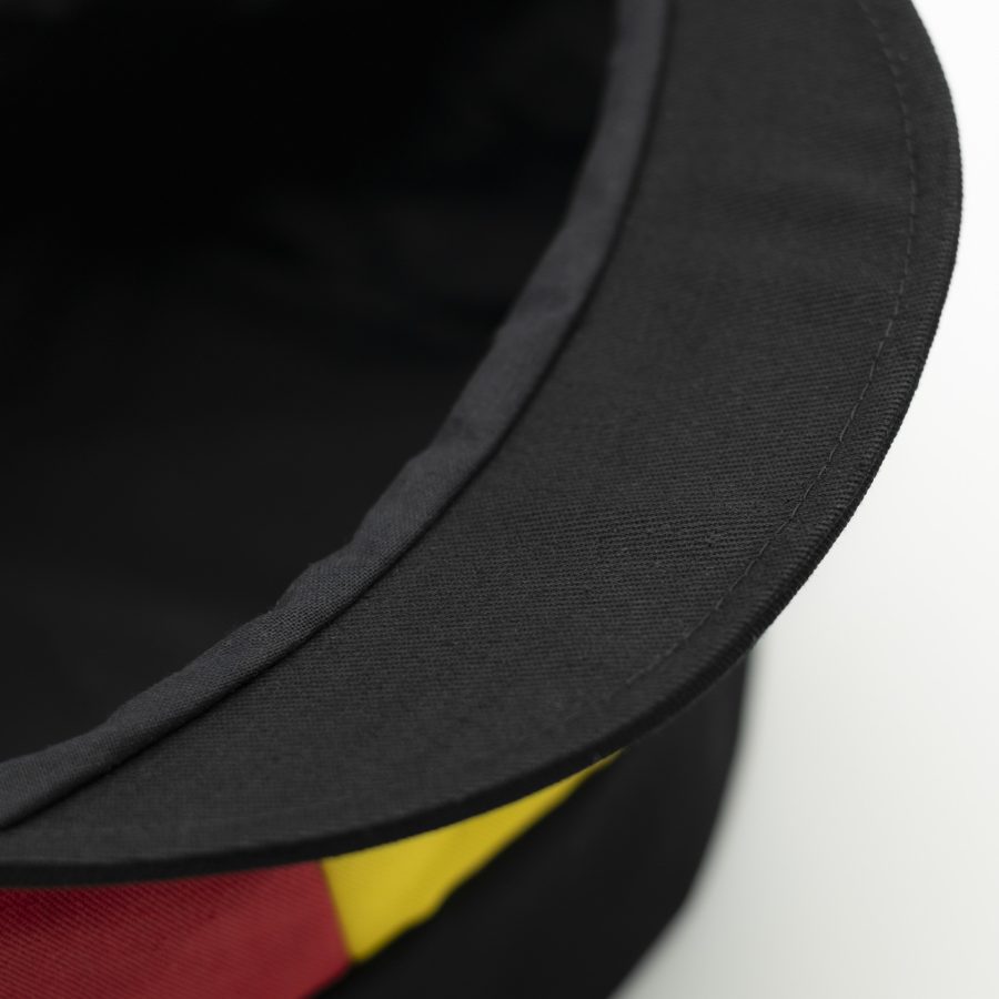 Dreadlocks crown with visor in black cotton with a Ethiopian flag on the front and a black lining