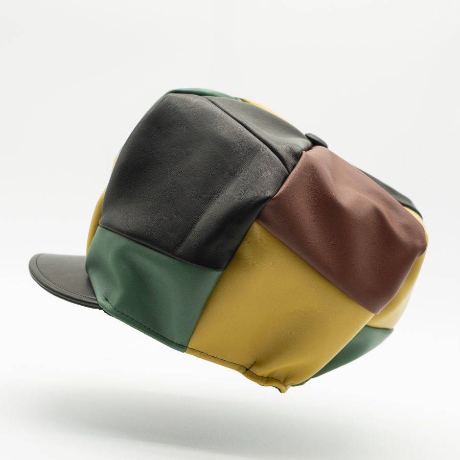 Handmade underground Rasta hat for dreadlocks made with vintage black, red, gold and green lamb leather and black lining