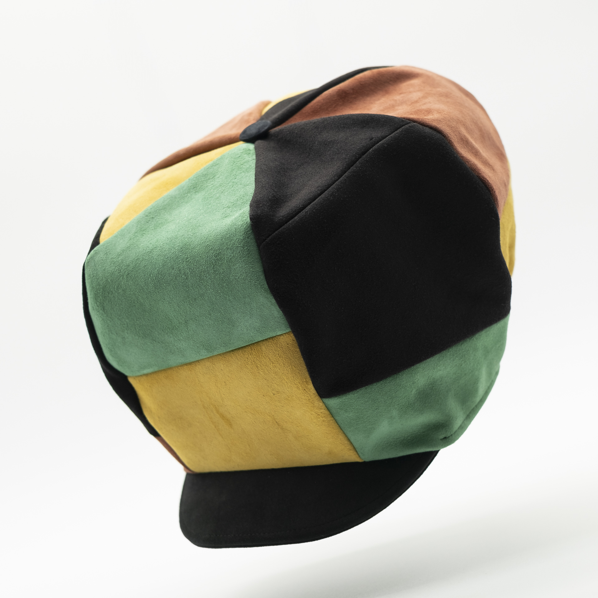 Handmade underground Rasta crown for dreadlocks made with vintage black, red, gold and green flesh split lamb leather and black lining