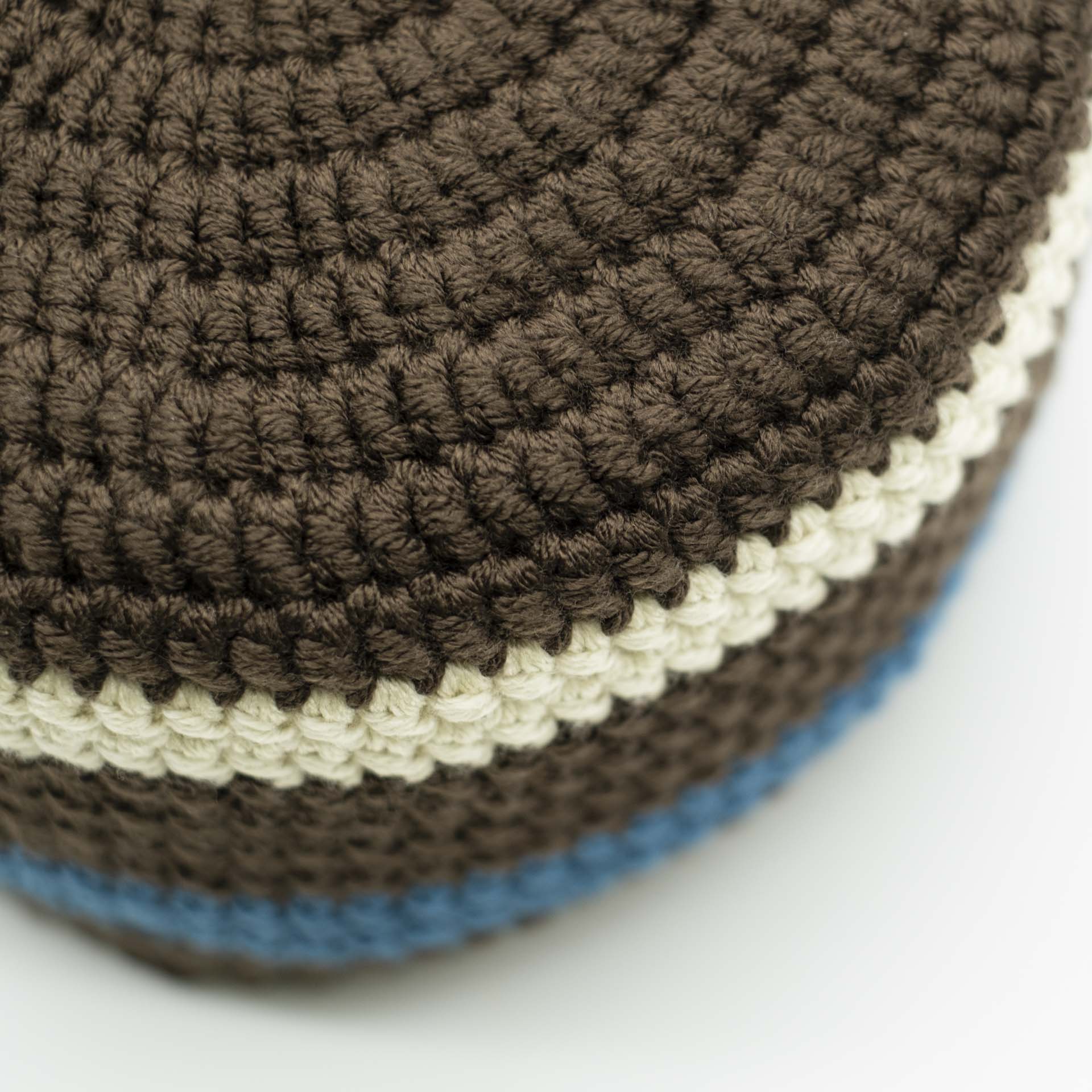 Beanie for dreadlocks brown with a cream band at the top and a blue band at the bottom