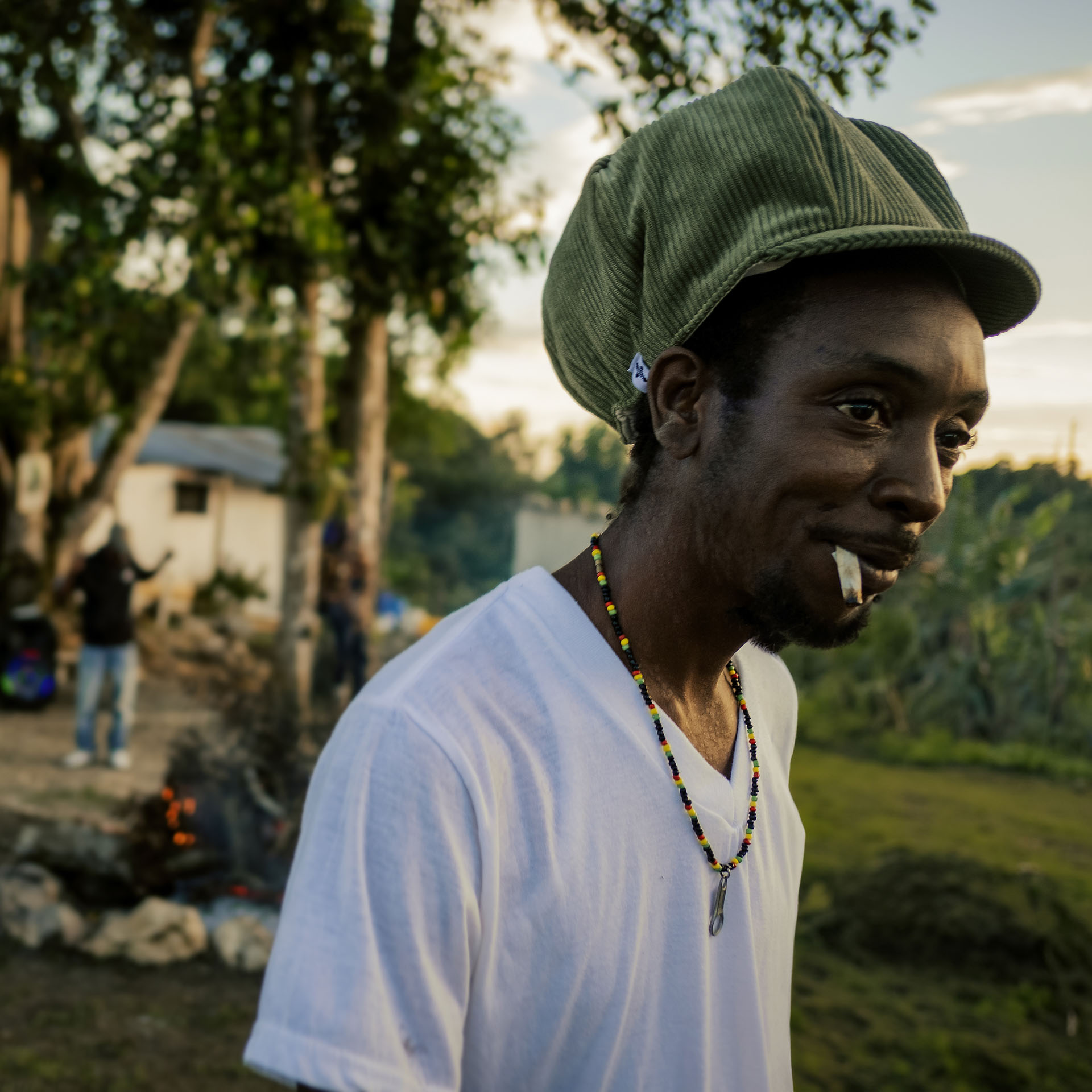 Rasta smoking a spliff and wearing a khaki corduroy dreadlocks hat from the Rocksteady collection