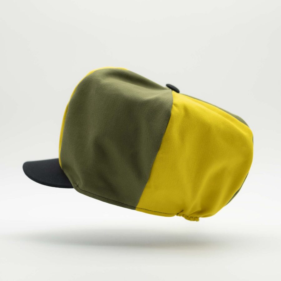 Rasta newsboy cap with black visor for dreadlocks in green and yellow duo cotton in the colors of Jamaica and black lining