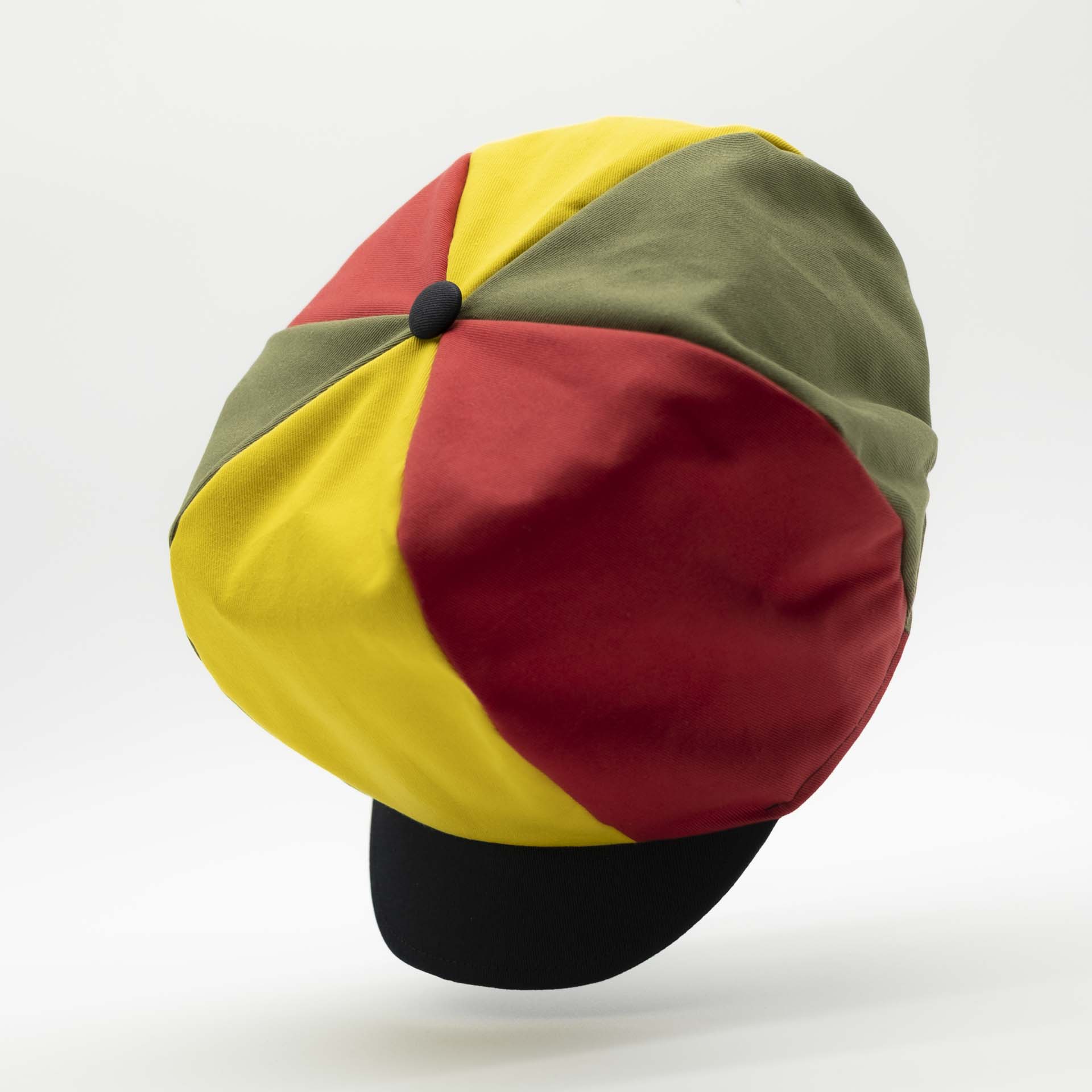 Rasta newsboy cap with black visor for dreadlocks in green yellow and red cotton in the colors of Ethiopia and black lining