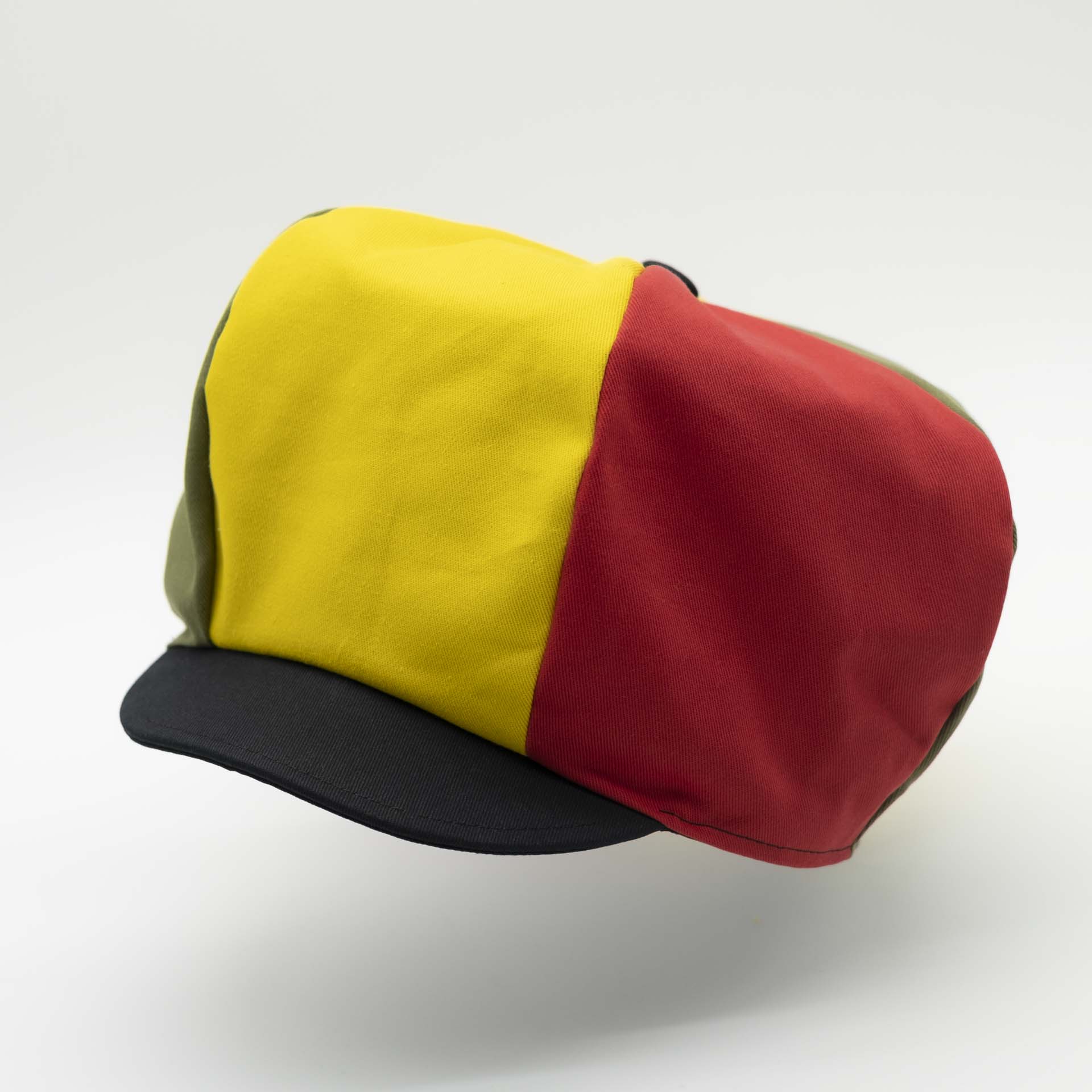 Rasta newsboy cap with black visor for dreadlocks in green yellow and red cotton in the colors of Ethiopia and black lining