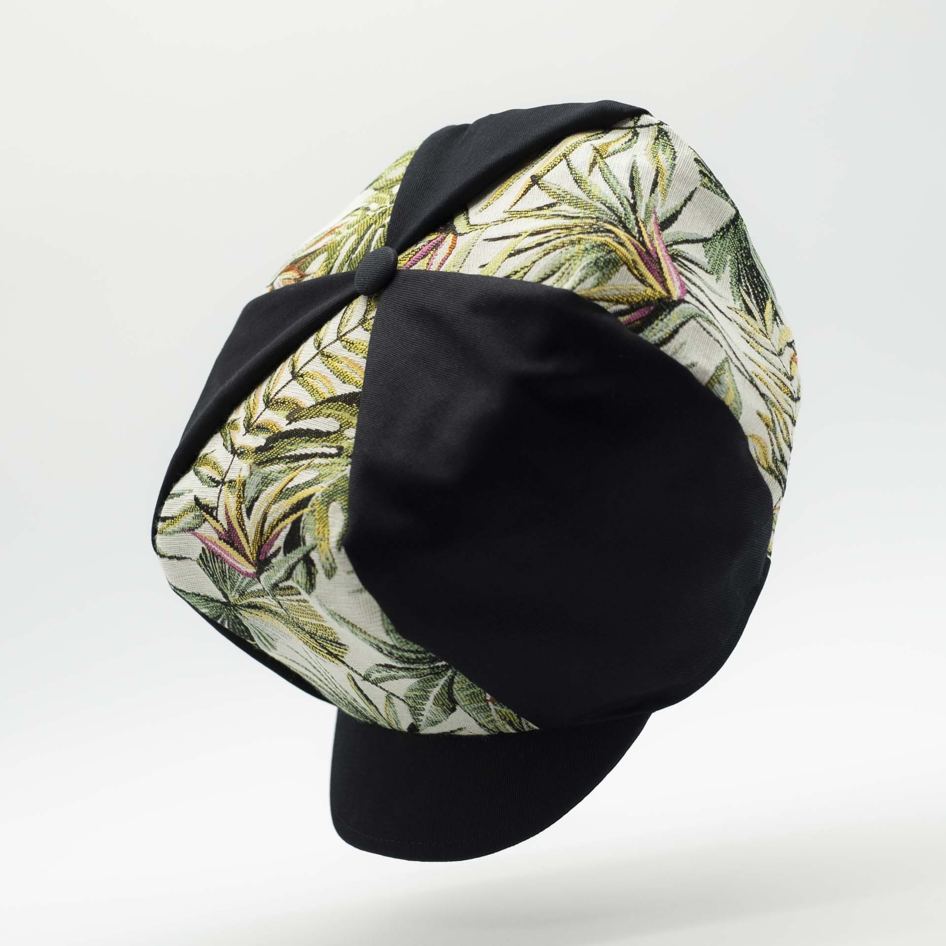 Rasta newsboy cap with visor with mix of black cotton and tropical jungle weave black lining