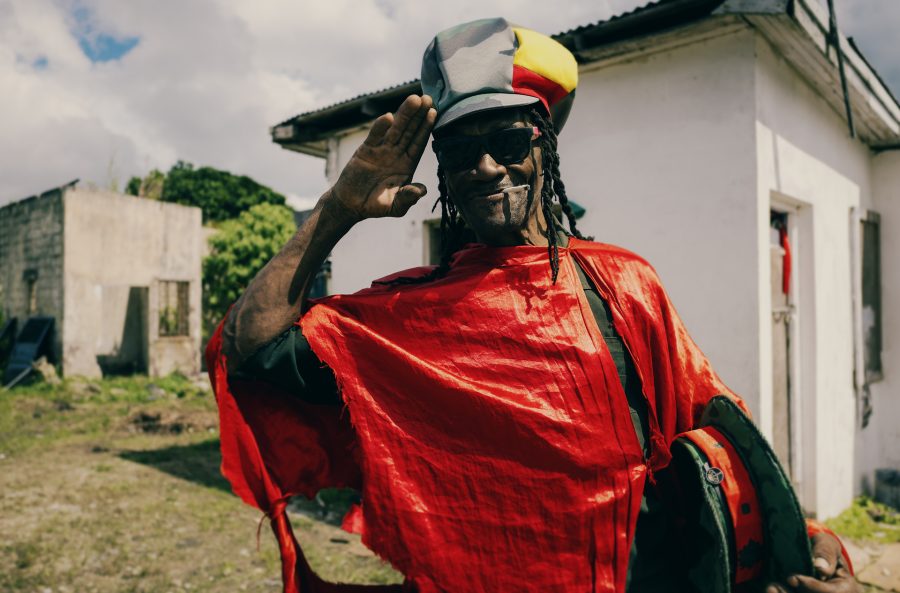 A militant rasta with a camo army dreadlocks hat