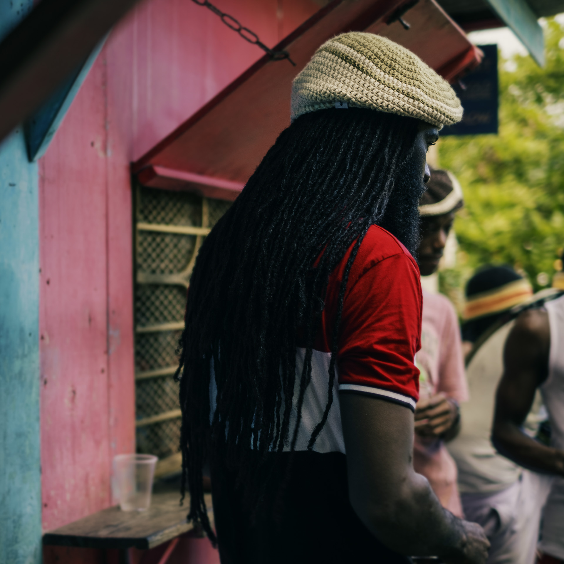 Jamaican Rastas at the pub with Dreadlocks hat